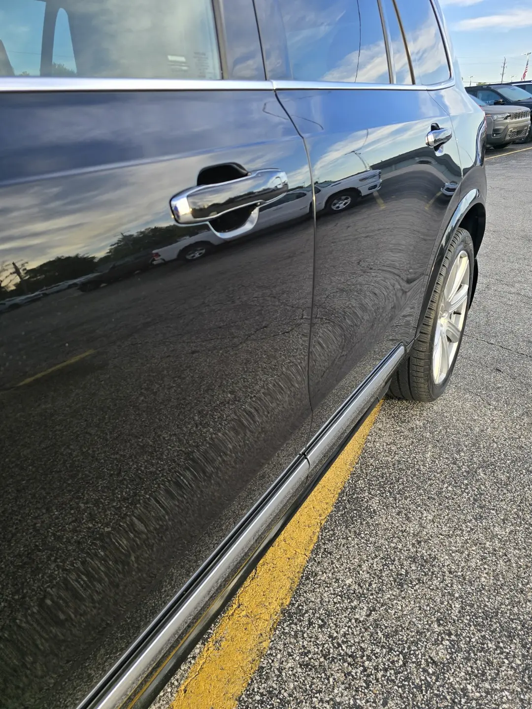 Crisp reflections along the Volvo XC90 side after polishing and coating
